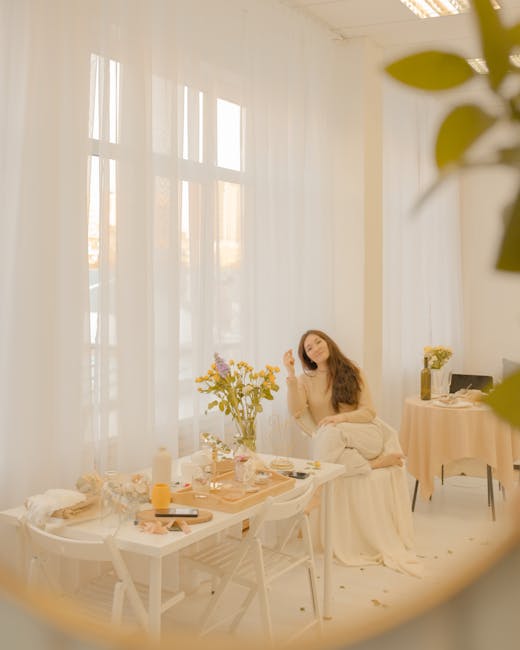 Serene woman in a bright living room doing a comfortable forward bend